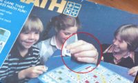 Board game cover showing young girl wearing wedding ring.